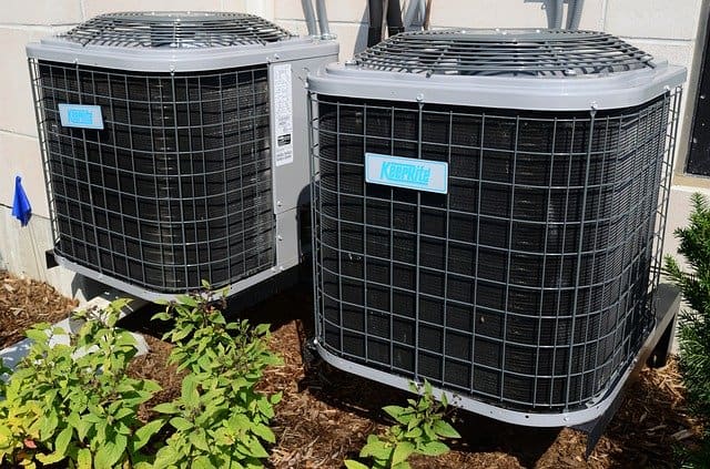 Photo of two outside air conditioning units placed side by side