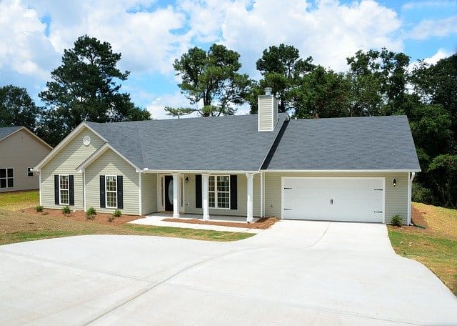 Photo: Single Story Beige Home in the Ranch House Style